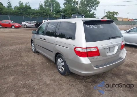 2007 Honda Odyssey Lx z USA, uszkodzony, nr VIN 5FNRL382X77B13260